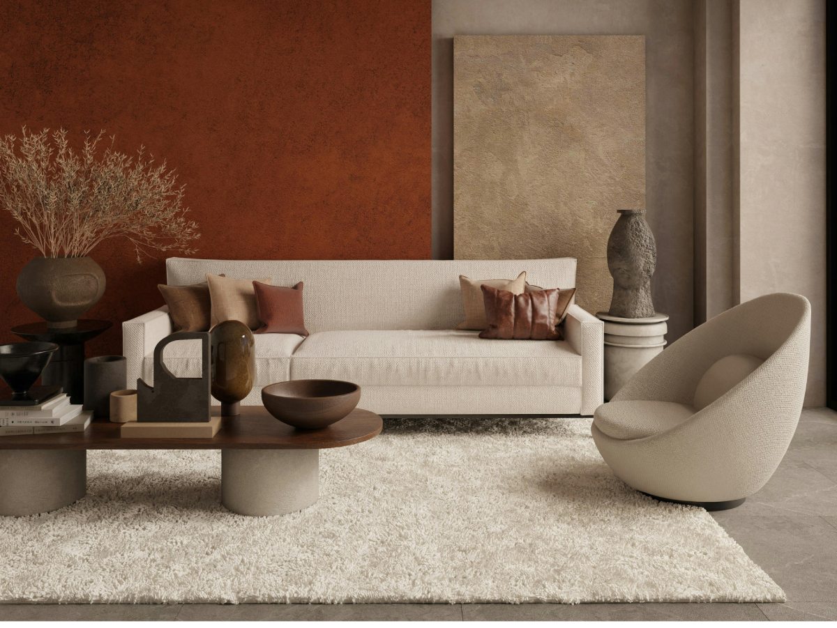 軟裝設計透過沙發、地毯與燈具的搭配，建立清楚的空間層次，讓客廳在機能與美感之間取得平衡，呈現舒適又耐看的居家氛圍。